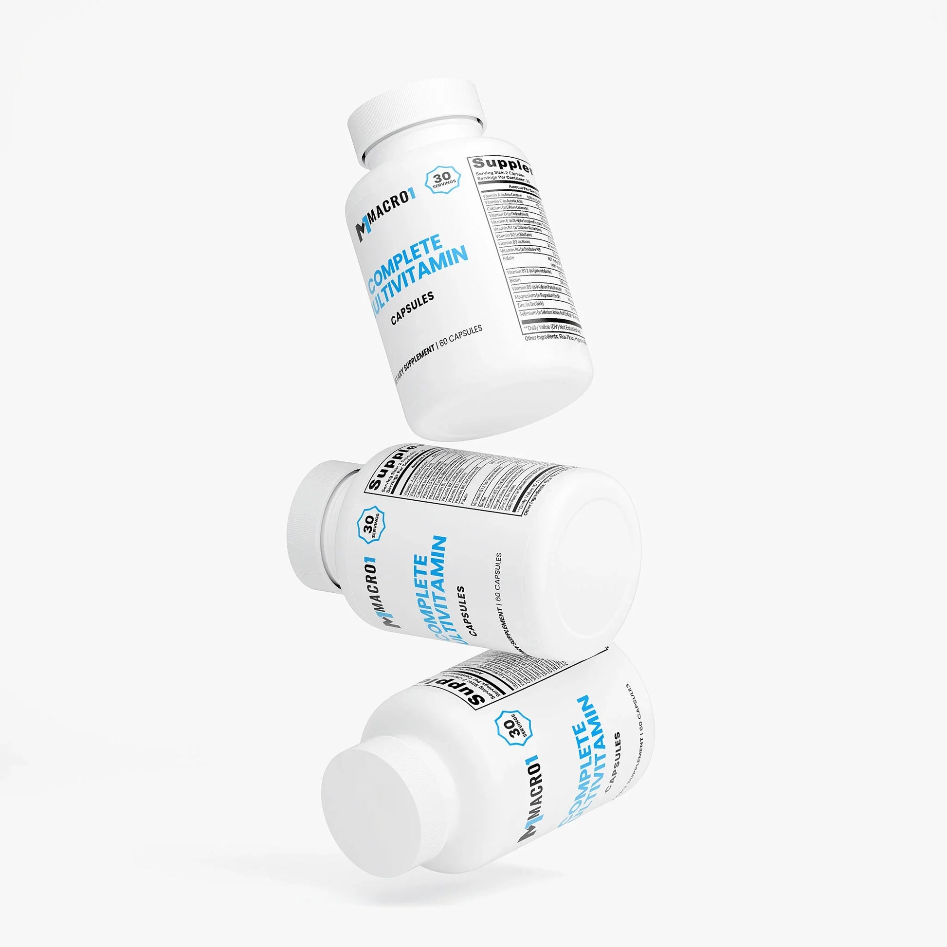 Three bottles of Macro Complete Multivitamin on a white background